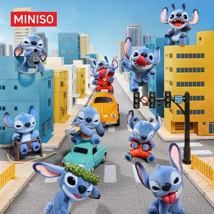 Disney Stitch What Mischief Series figure blind box collection displayed in a playful city street scene with multiple Stitch figurines.