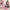 Young lady packing MiNISO Barbie storage pouches into suitcase at home