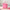 Miniso Barbie pink perforated tote bag displayed on book with small doll