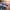MINISO Disney Stitch Confession Highway Series convertible car keycap figures on coastal highway.