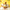 Close-up of MINISO Minions Bob plush wearing a soft brown bear costume with mismatched eyes