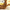 Detailed view of the fluffy brown costume and embroidered face on the MINISO Minions Bob plush