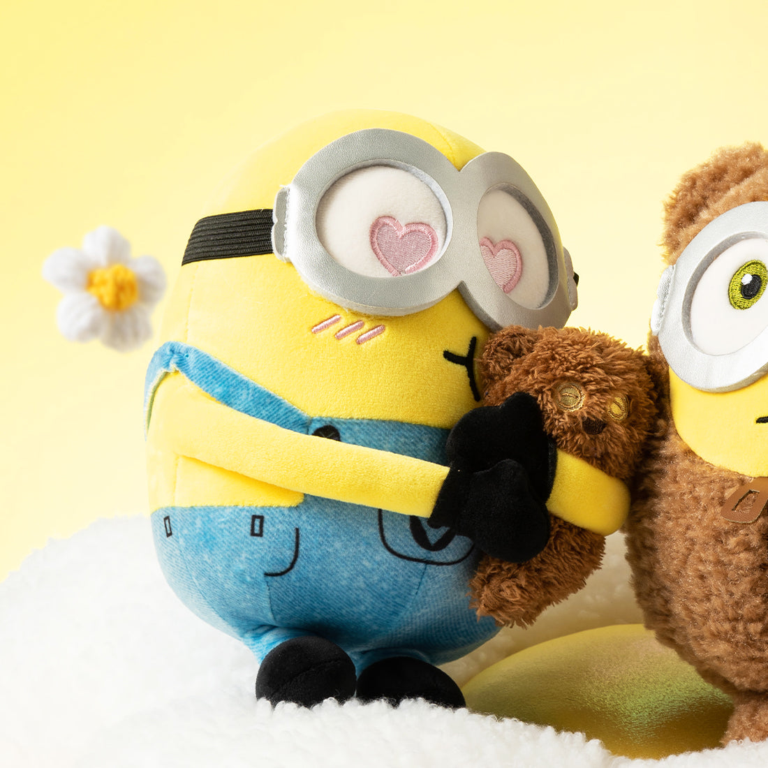 MINISO Minions Bob hugging Tim teddy bear plush with embroidered heart-shaped eyes