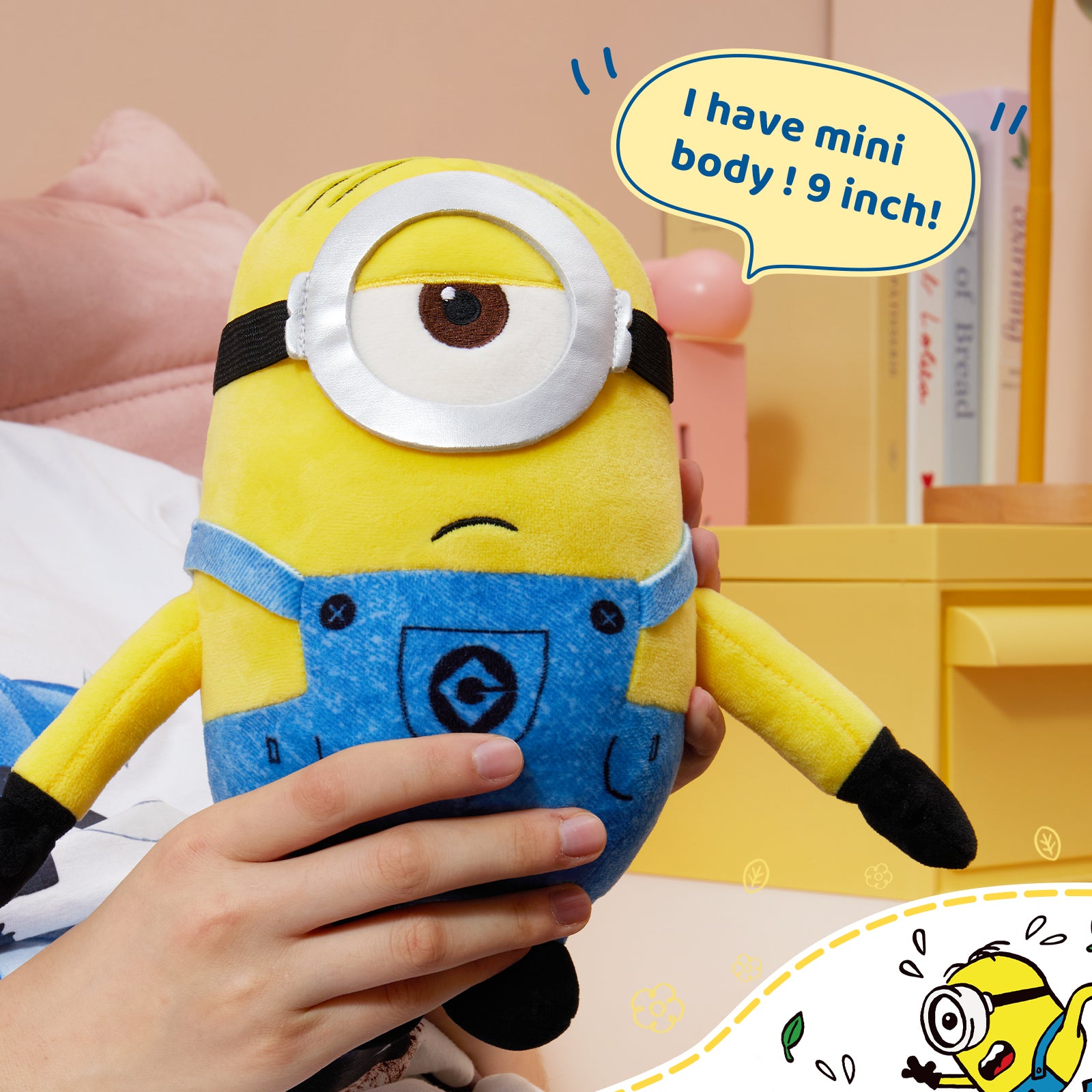 MINISO Minions Stuart 9-inch plush toy held in hand beside books in a cozy room