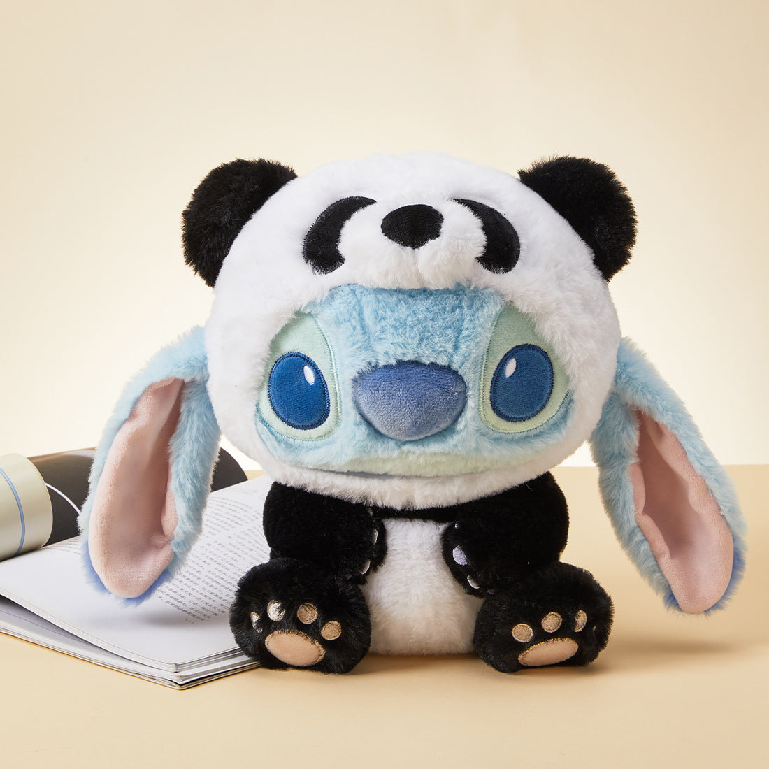 MINISO Panda Stitch plush toy placed on table for home decoration