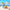 MINISO Stitch Limited Hours Job figure standing beside a tropical beach fruit cart