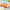 Cute fruit‑styled YOYO figure seaside picnic scene presentation