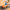 Disney Angel wearing sunglasses in a orange race car figure