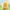 Bee‑costume Winnie The Pooh collectible figurine photographed in fresh outdoor grass‑field setting