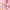 Pink‑haired YOYO Angel Baby figure on soft cushion scene